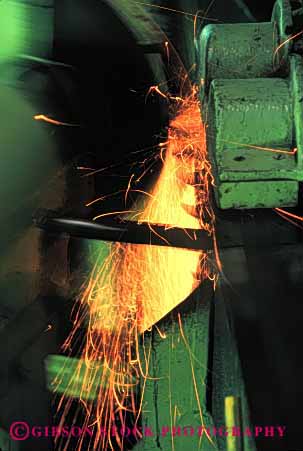 Stock Photo #2974: keywords -  danger equipment grind hot industry machine mechanical metal moving parts risk sharpen sparks technology tool vert