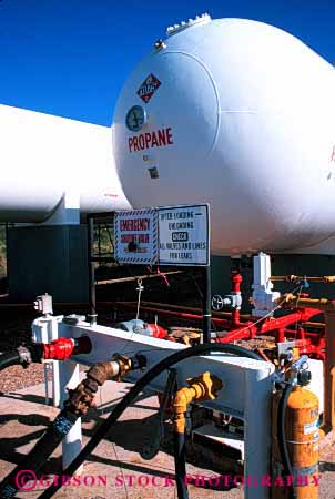Stock Photo #2975: keywords -  combustible danger equipment explosive flammable gas industry machine mechanical moving paint parts pressure propane pump risk storage tank technology valve vert warning white