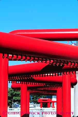 Stock Photo #6166: keywords -  equipment hardware industrial industry machine new pipe red round tube vert