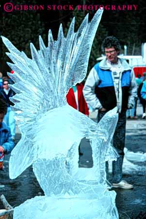 Stock Photo #2983: keywords -  animal art carve clear cold create eagle frozen ice melt salmon sculpture temporary vert water with