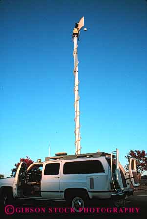 Stock Photo #2985: keywords -  antenna broadcast car communicate electronic equipment field industry metal network news reception remote tall technology telecommunicate telecommunications telescope tower truck unit vehicle vert