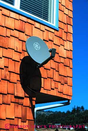 Stock Photo #2986: keywords - antenna broadcast communicate dish electronic equipment home industry metal network receive reception residential satellite technology telecommunicate telecommunications television tv vert