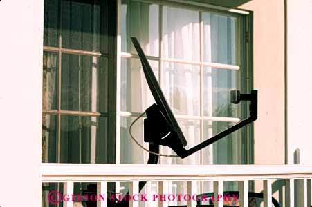 Stock Photo #2987: keywords -  antenna broadcast communicate dish electronic equipment home horz industry metal network receive reception residential satellite technology telecommunicate telecommunications television tv