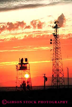 Stock Photo #2988: keywords -  antenna broadcast communicate electronic equipment industry metal network radio receive reception silhouette sunset technology telecommunicate telecommunications vert