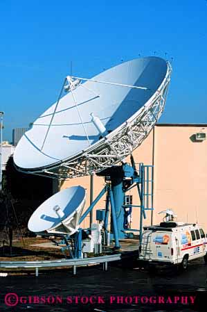 Stock Photo #2992: keywords -  antenna big broadcast communicate dishes electronic equipment industry large metal network receive reception round satellite station technology telecommunicate telecommunications television vert white