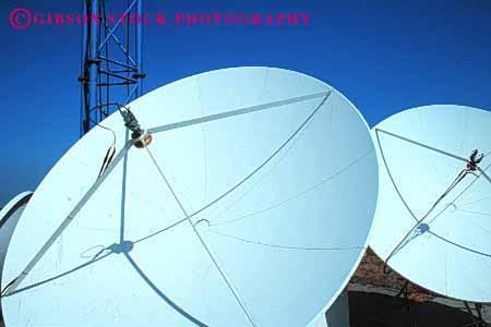 Stock Photo #2997: keywords -  antenna broadcast communicate dishes electronic equipment horz industry metal network receive reception satellite technology telecommunicate telecommunications white