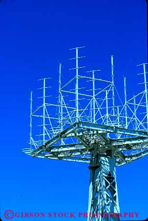 Stock Photo #6165: keywords -  antenna broadcast communicate communicating communications complex equipment industry machine pointed radio receive receiver sharp technology telecommunications vert white