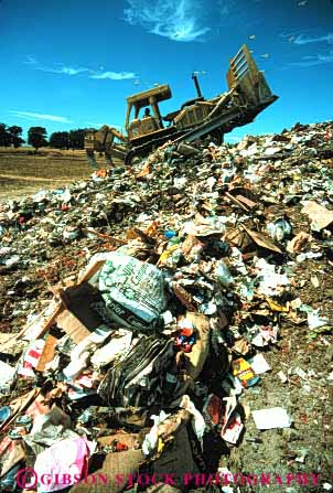 Stock Photo #3008: keywords - disposal dispose dump effluent environment garbage landfill solid tractor trash vert waste