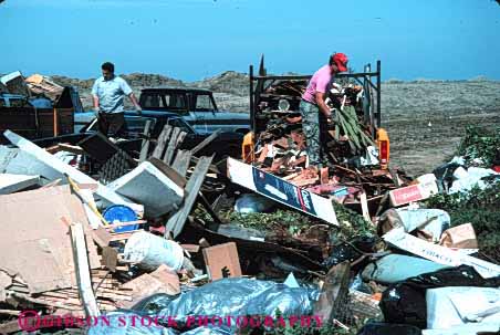 Stock Photo #3012: keywords -  disposal dispose dump dumping effluent environment garbage horz landfill people solid trash waste