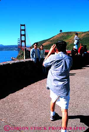 Stock Photo #6163: keywords -  asian bridge ethnic explore foreign gate golden group minority photo photograph pose race travel travelers traveling vacation vert visit visitor