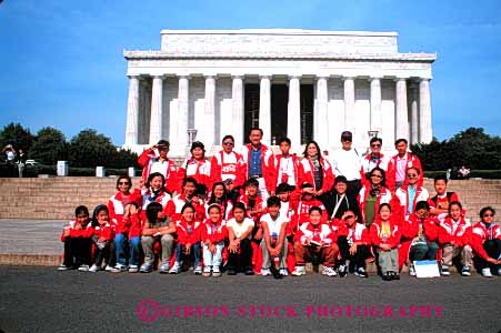 Stock Photo #6164: keywords - asian ethnic explore foreign gender group horz lincoln men minority mixed monument photo pose race red travel travelers traveling uniform vacation visit visitor women