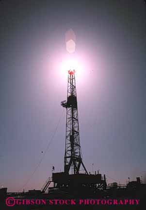 Stock Photo #3042: keywords - drill drilling industry oil rig silhouette tall tower vert