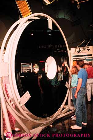 Stock Photo #3055: keywords -  astronomy circle collect examine glass hubbell light mirror mission observatory outer reflect replica research round science shiny sight space stars study technology telescope vert vision