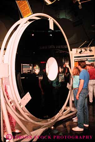 Stock Photo #3055: keywords - astronomy circle collect examine glass hubbell light mirror mission observatory outer reflect replica research round science shiny sight space stars study technology telescope vert vision