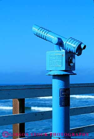 Stock Photo #3058: keywords -  beach blue distance examine light look machine observe pay pier sight study telescope vert vision