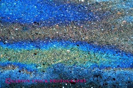 Stock Photo #3064: keywords -  abstract horz iridescence iridescent light oil pavement pollution rainbow reflection sheen slick spectrum water