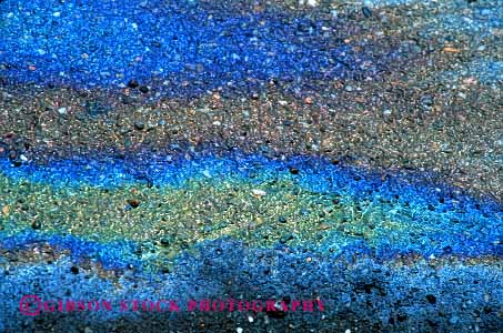 Stock Photo #3064: keywords - abstract horz iridescence iridescent light oil pavement pollution rainbow reflection sheen slick spectrum water