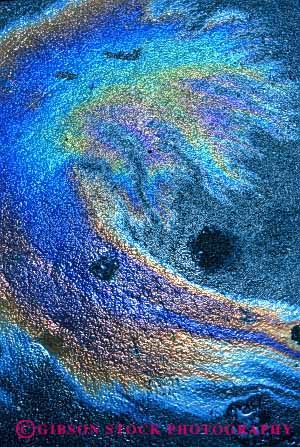 Stock Photo #3065: keywords -  abstract iridescence iridescent light oil pavement pollution rainbow reflection sheen slick spectrum vert water