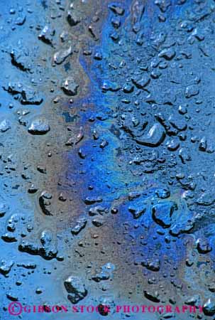 Stock Photo #3066: keywords - abstract light oil pavement pollution rainbow reflection sheen slick spectrum vert water