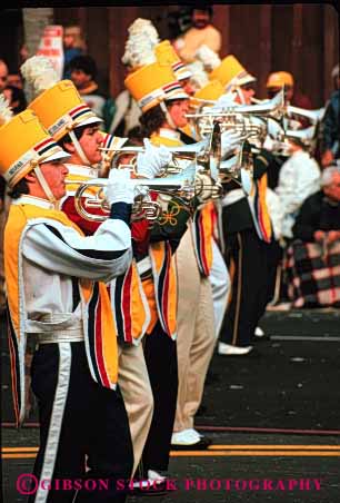 Stock Photo #3072: keywords - band celebrate colorful coordinate horn instrument marching move music musician noise not parade performance practice released row section show sound team together uniform vert walk wind