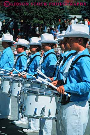 Stock Photo #3073: keywords -  adolescent adolescents band boy boys celebrate colorful coordinate drum drummer drummers drumming drums group groups hat hats march marches marching move music musical musician musicians noise parade parades percussion performance performer performers performs practice row rows section show shows sound student students team teams teen teenage teenager teenagers teens together uniform uniforms vert walk young youth