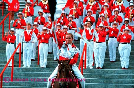 Stock Photo #3078: keywords -  band celebrate colorful coordinate horz marching move music musician noise not parade performance practice red released row show sound team together uniform walk