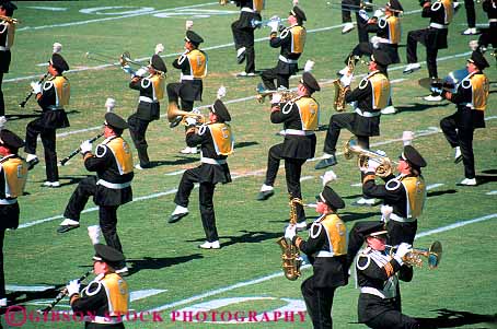 Stock Photo #19856: keywords -  above band bands berkeley brass california college coordinate coordinated coordinating coordination elevated field fields football form formation formations forms group groups harmonize harmony horns horz instrument instruments line lines march marches marching music musician musicians organize organized overhead pattern patterns people perform performance performing performs person practice routine row rows show showing shows student students synchronize synchronized uc uniform uniforms unison unity view wind