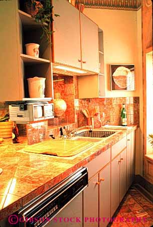 Stock Photo #3084: keywords -  architecture counter custom decorate design home house interior kitchen modern vert
