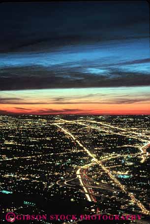 Stock Photo #3117: keywords - abstract bright chicago city elevated geometric geometry grid horizon illinois lighting lights night pattern street streets suburb sunset sunsets urban urbanization vert view
