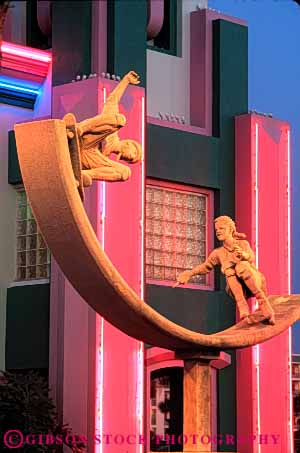 Stock Photo #6157: keywords -  advertise advertisement art beach bright cocoa color colorful dusk front jon light lighting neon pink ron sculpture sign skateboard store surfshop vert