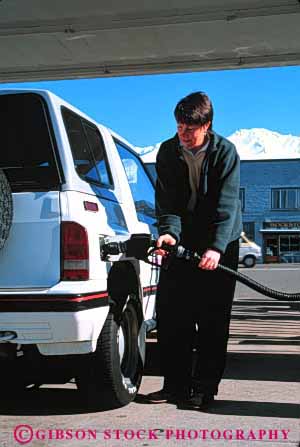 Stock Photo #3145: keywords -  auto car fuel gas gasoline handle hose industry machine nozzle people person petroleum pump pumping pumps recovery released service station transportation valve vapor vehicle vert woman