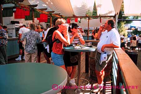 Stock Photo #3166: keywords - activity adult adults alcohol amusement annual attraction cafe california couple drink drinking drinks event fair family festival fun horz park parks people person play public relax sacramento sample samples sampling shade state summer taste tasting wine