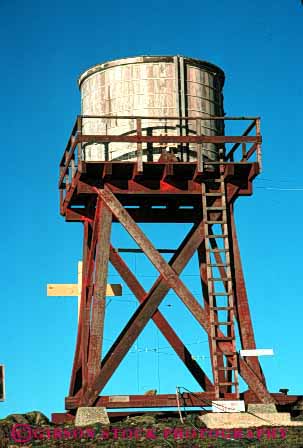 Stock Photo #3177: keywords - angle brace circle cylidrical cylinder elevate elevated engineer flow frame geometric geometry gravity heavy old round shape shaped storage storing tank tanks tower towers vert volume water wood