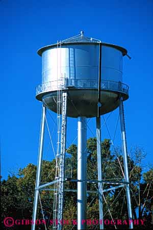 Stock Photo #3179: keywords -  angle brace circle cylidrical cylinder elevate elevated engineer flow frame geometric geometry gravity heavy round shape shaped storage storing tank tanks tower towers vert volume water