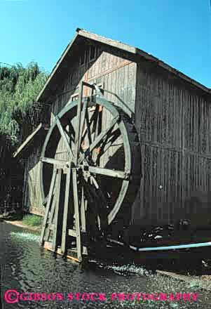 Stock Photo #3180: keywords -  angle antique axis brace circle circular elevate engineer flow frame geometric geometry gravity machine mill old radial rotate rotates rotating rotation round spokes symmetry vert vintage water waterwheel waterwheels wheel wheels wood