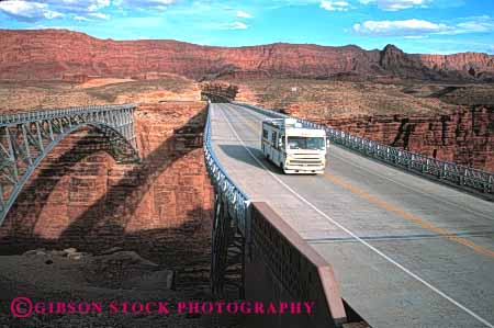 Stock Photo #3197: keywords -  arizona bridge convenient drive dusk highway home horz large motor motorhome navajo recreational rv travel vacation vehicle