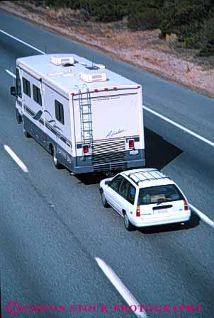 Stock Photo #3207: keywords - car caution convenient drive highway home large motor motorhome pull recreational risk rv safety second tow travel vacation vehicle vert