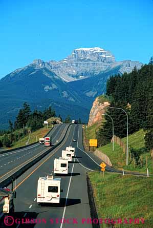 Stock Photo #3221: keywords -  banff camp camper canada convenient divided elevated group highway mountain national park recreational rv summer travel vacation vehicles vert view