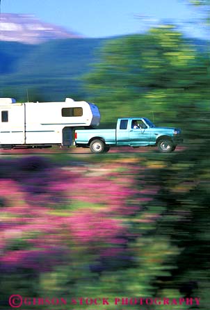 Stock Photo #3224: keywords - blur camp camper convenient dynamic highway horz motion movement pick pull recreational rv tow trailer travel truck up vacation vehicle