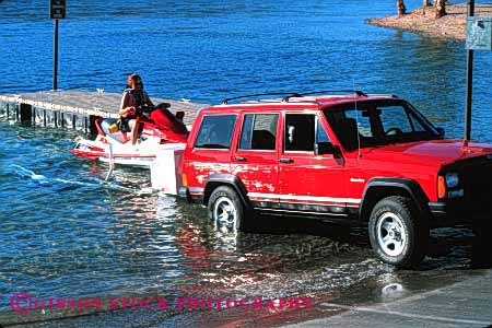 Stock Photo #3235: keywords -  auto boat car drive four horz jet lake launch pull recreational red ski slope sport suv tow trailer utility vehicle water wheel
