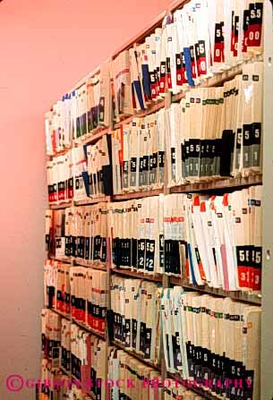 Stock Photo #3245: keywords - administration building business commerce data file interior medical office organize paper records vert