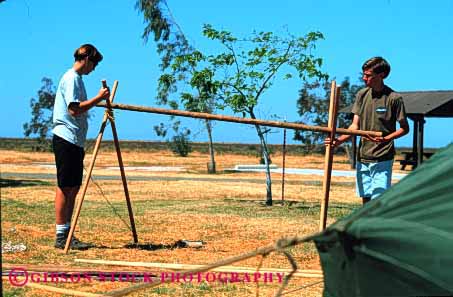 Stock Photo #4005: keywords -  activity adolescent boy children club cooperate craft frame group horz knots learn practice rope scout scouts skill summer team teenage together wood