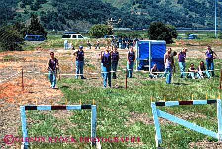 Stock Photo #4009: keywords - activity adolescent children club cooperate craft female girl group heaving horz learn line mariner practice rope scout scouts skill summer team teenage throw together