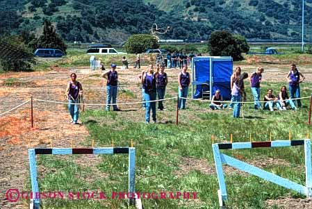 Stock Photo #4009: keywords -  activity adolescent children club cooperate craft female girl group heaving horz learn line mariner practice rope scout scouts skill summer team teenage throw together