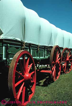 Stock Photo #4013: keywords -  cart covered historic old tradition transportation vert wagon west western wheel