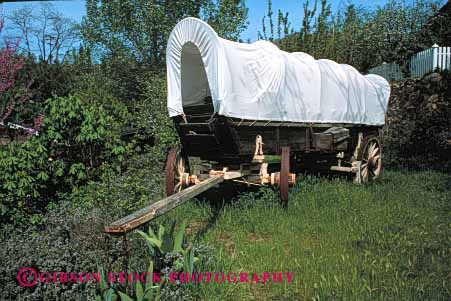 Stock Photo #4015: keywords -  cart conestoga covered historic horz old replica replicas tradition transportation wagon wagons west western wheel