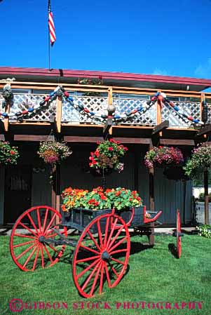 Stock Photo #4031: keywords -  antique carriage decorate decoration design exterior flower home house landscape lawn nasturtium plant potted residential vert yard