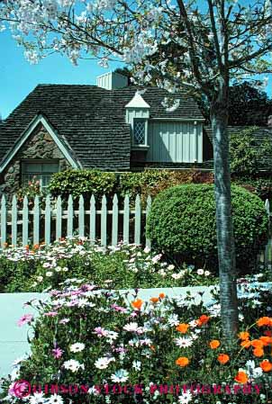 Stock Photo #4037: keywords -  blossom daises decorate design exterior fence flower fruit home house landscape picket residential tree vert yard