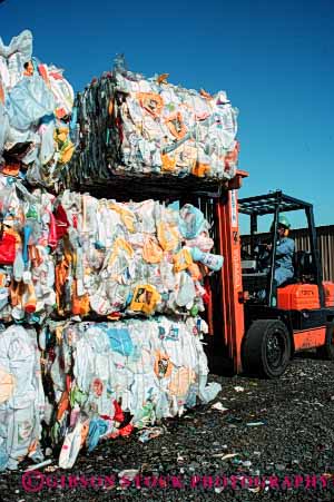 Stock Photo #4095: keywords -  bale bales california compact compacted compress compressed county crush crushed equipment fork heavy industry lift material operator plastic recycle recycles recycling resource reuse richmond squeeze squeezed vert west