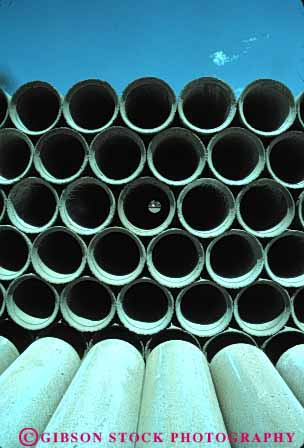 Stock Photo #4111: keywords -  circle concrete end geometrical geometry parallel pattern pipe repeat repetition round stack symmetry vert